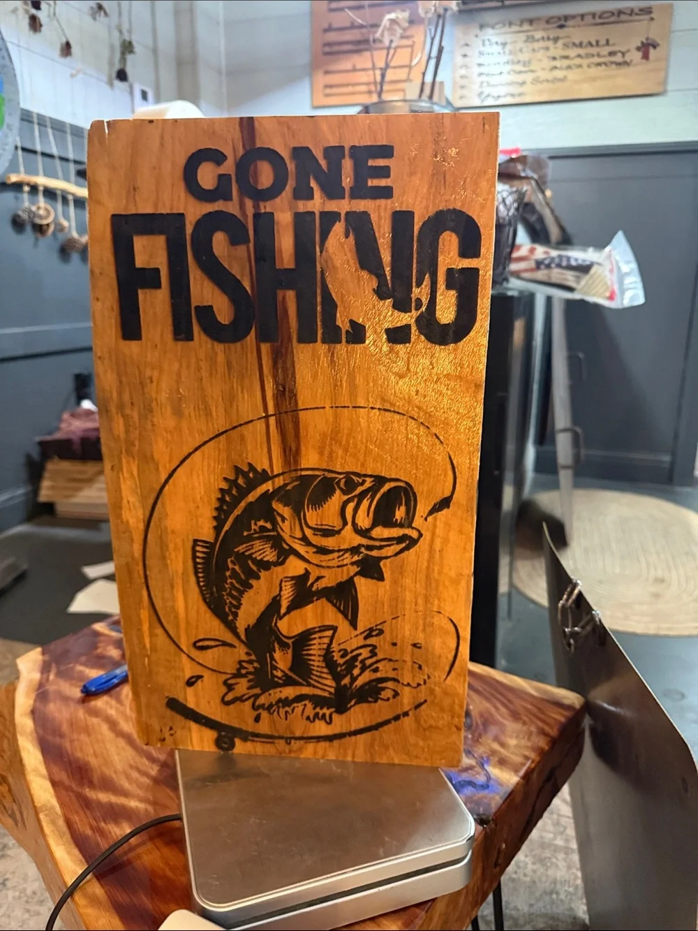 16” x 9” x 1.5” slice of log engraved 'Gone Fishing' Wood Sign - natural wood